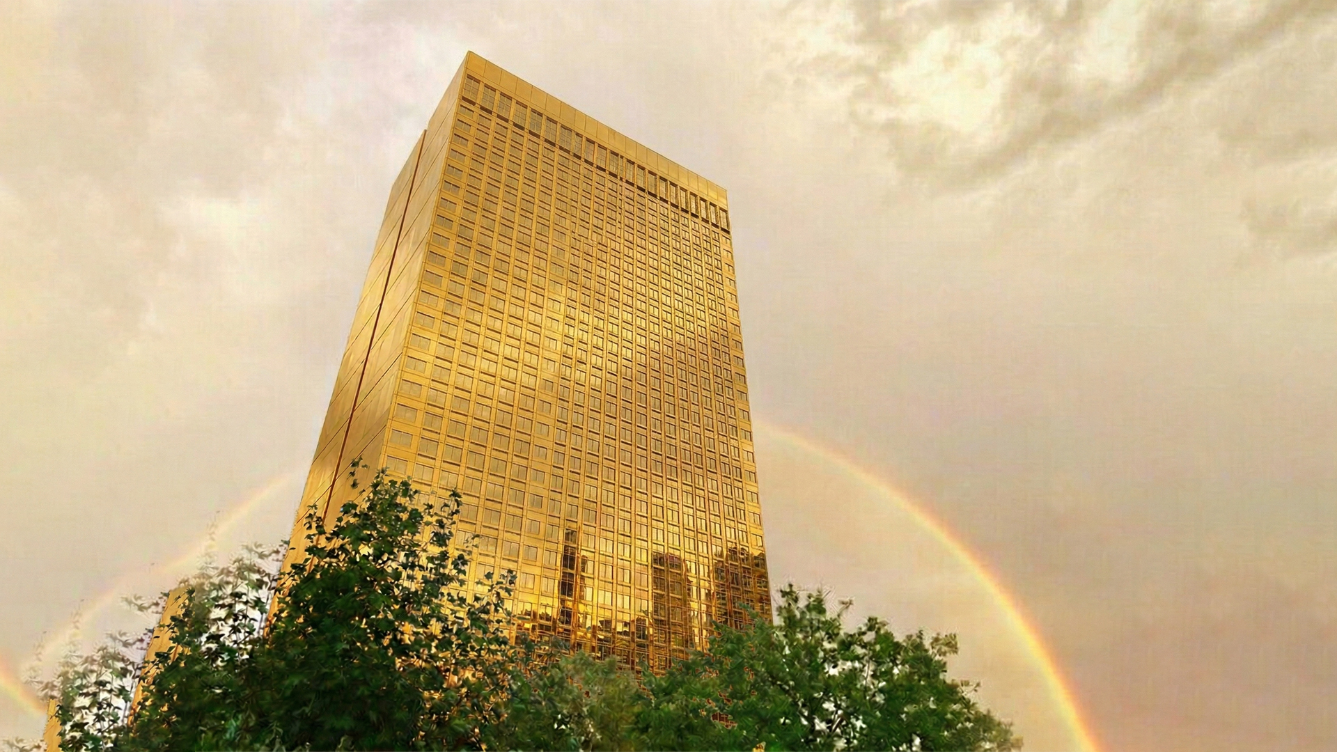 Golden Tower Munich street level with rainbow